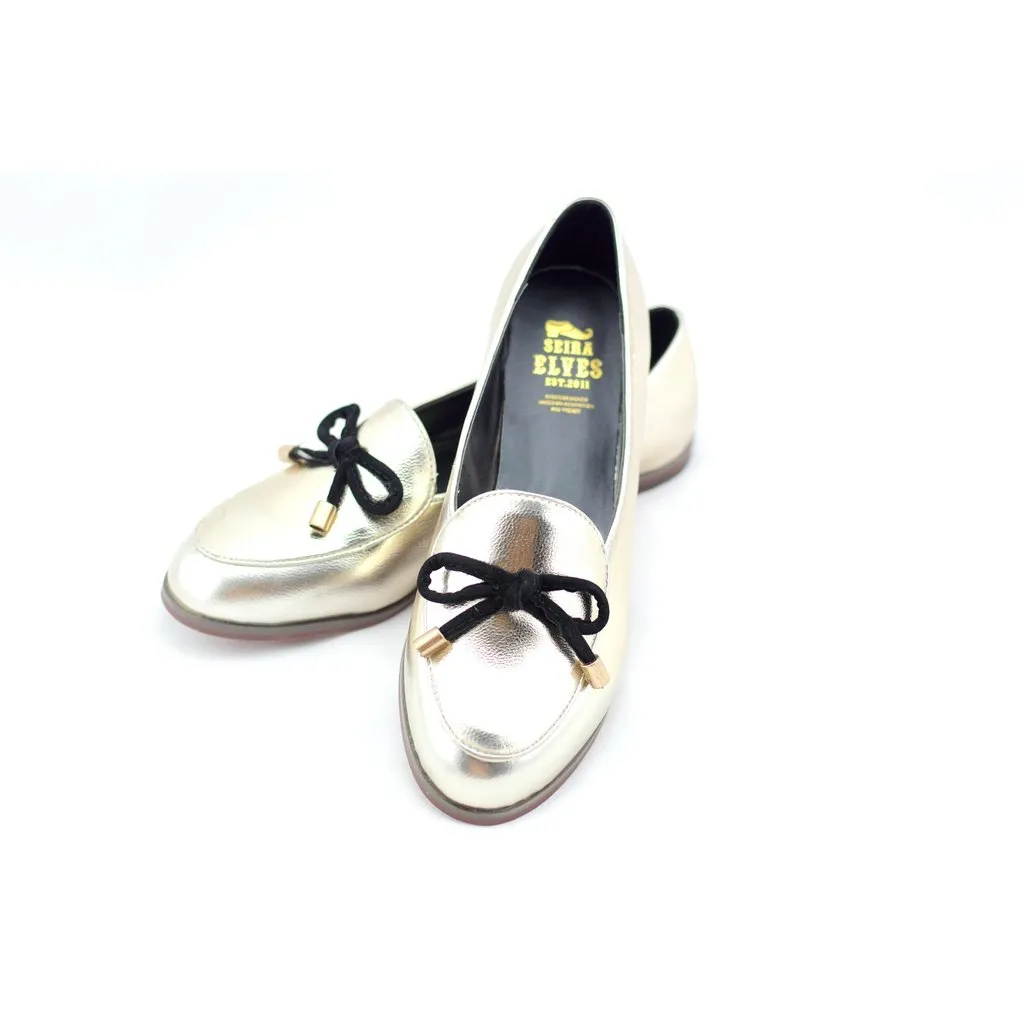 Oscar gold with a feminine bow loafers